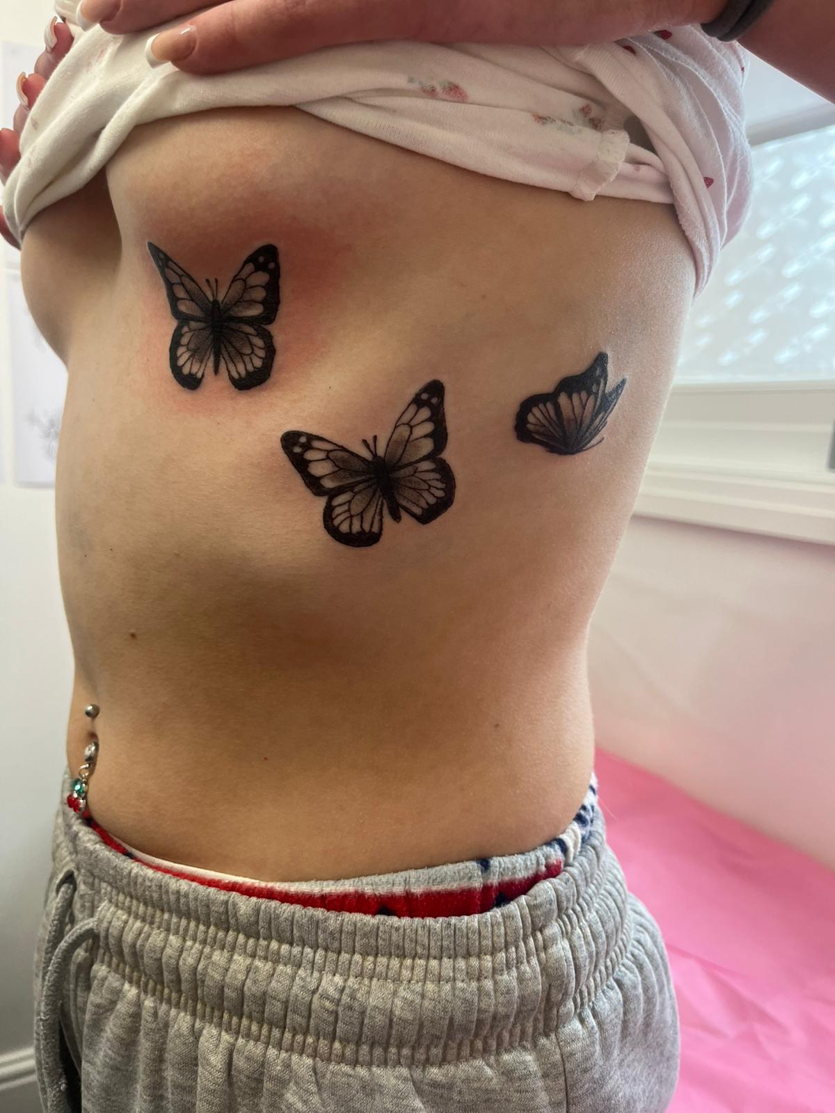 Delicate fine line floral tattoo by Ink By LOLO Merseyside Southport
