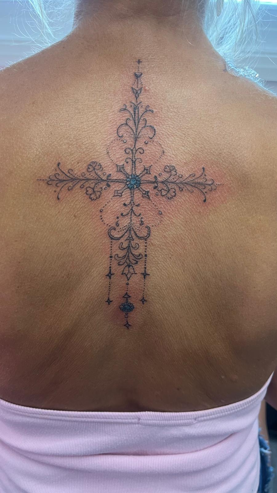 Subtle minimalist fine line tattoo by Ink By LOLO Ainsdale Merseyside